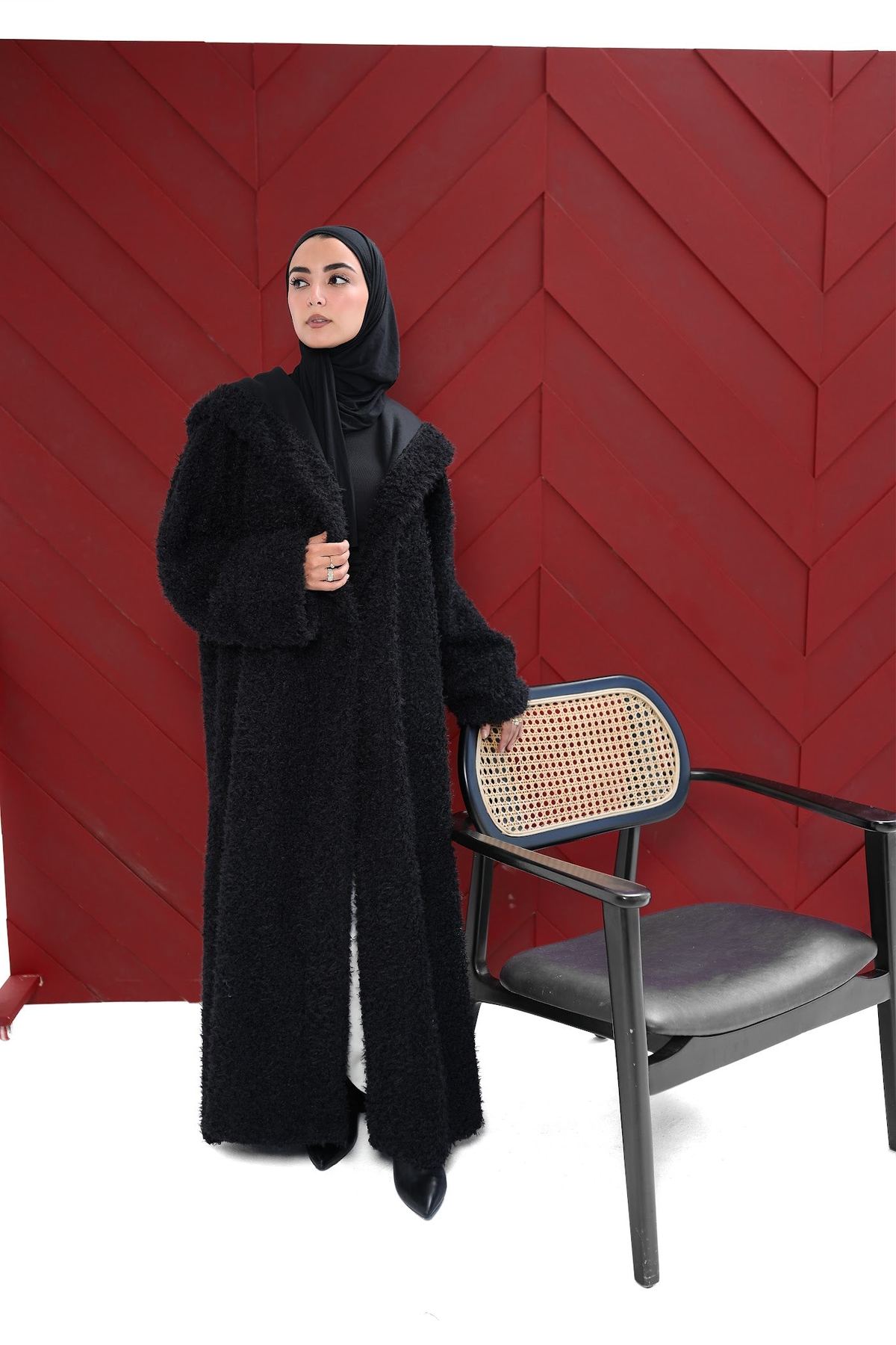 Komu Lale Winter 27 – black textured long coat